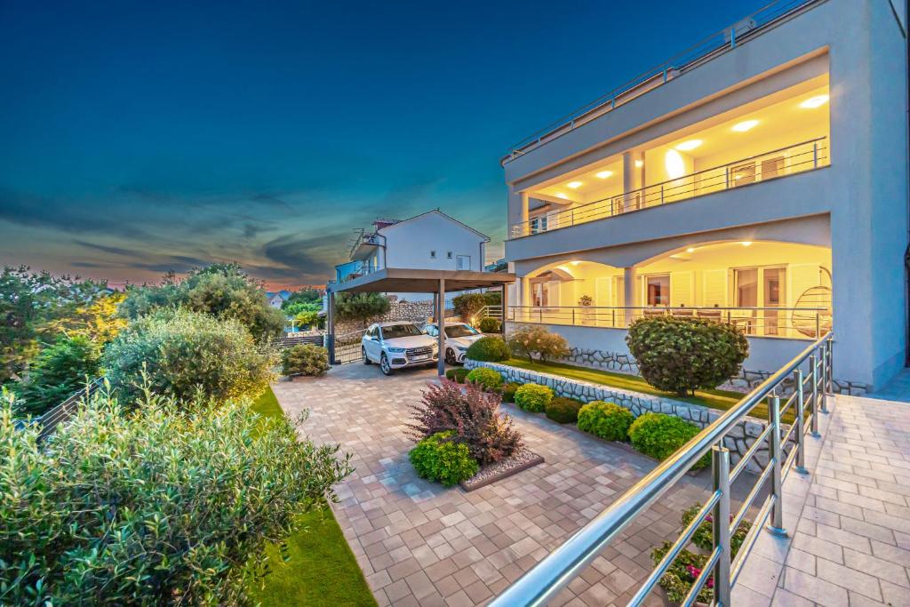 an aerial view of a house with a patio at Apartments Villa Residenca in Novi Vinodolski