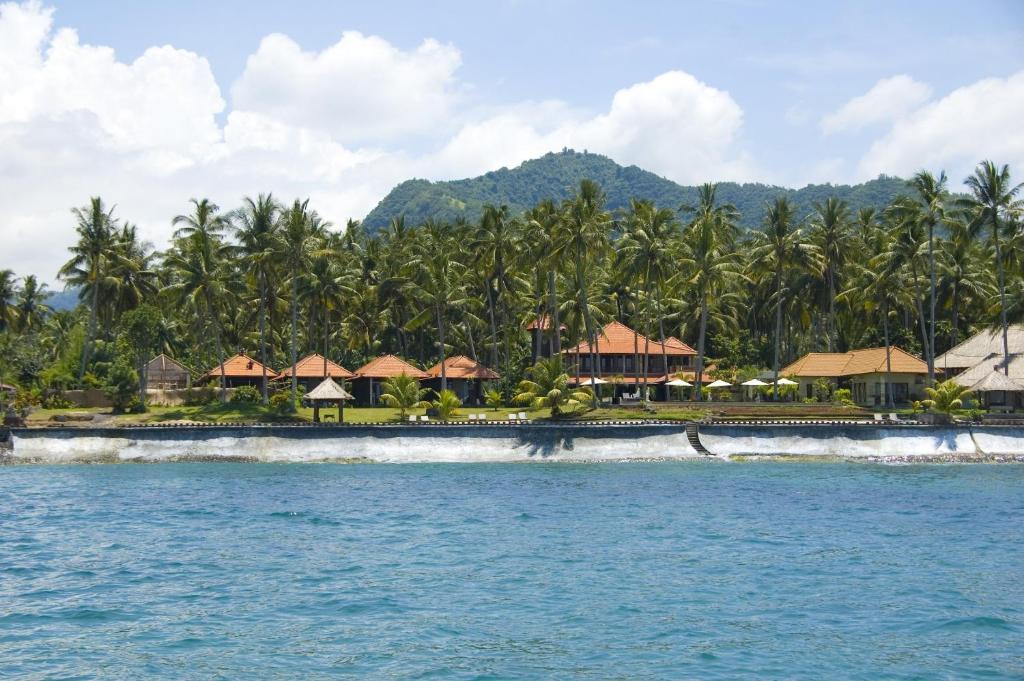 a view of a resort from the water at Sea Breeze Candidasa in Candidasa