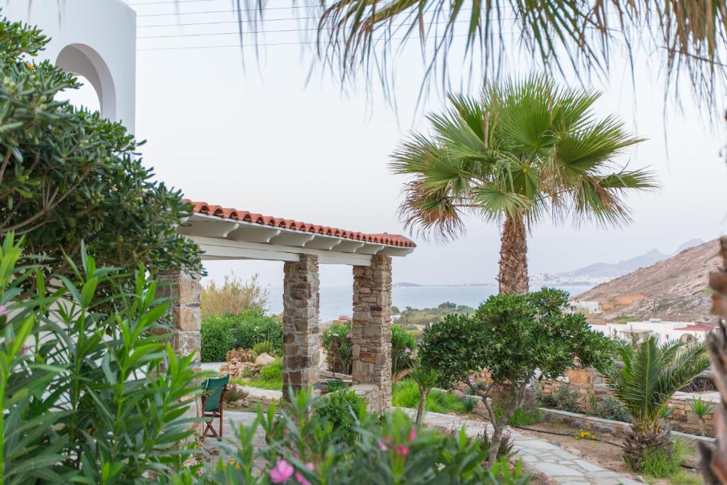 a view of a villa with a palm tree at Villa Lena in Stelida