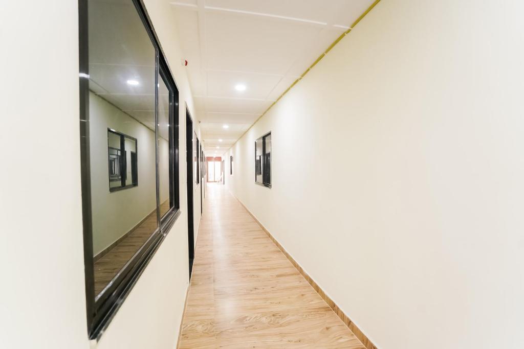 Μια τηλεόραση ή/και κέντρο ψυχαγωγίας στο Hotel O Vijaya Guest House