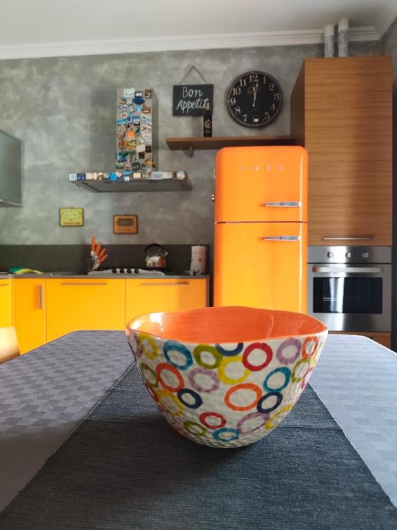 a bowl sitting on a table in a kitchen at La casa di Betta in Lerici