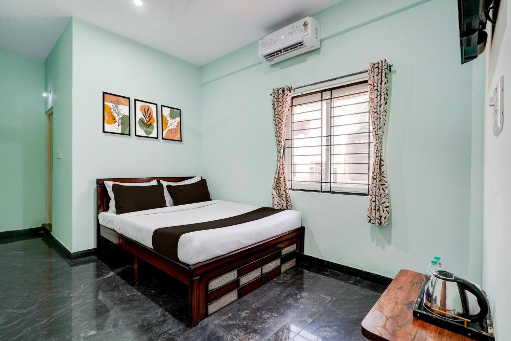 Postel nebo postele na pokoji v ubytování Hotel O Nature Comforts