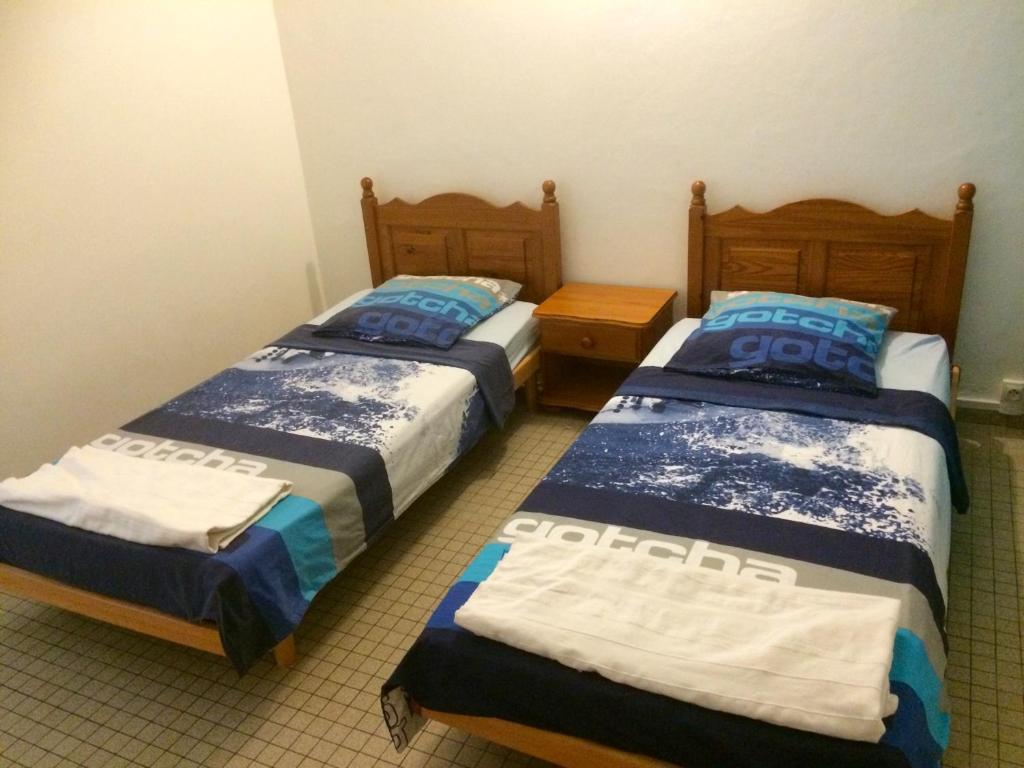 Postel nebo postele na pokoji v ubytování Maison Petit Paradis