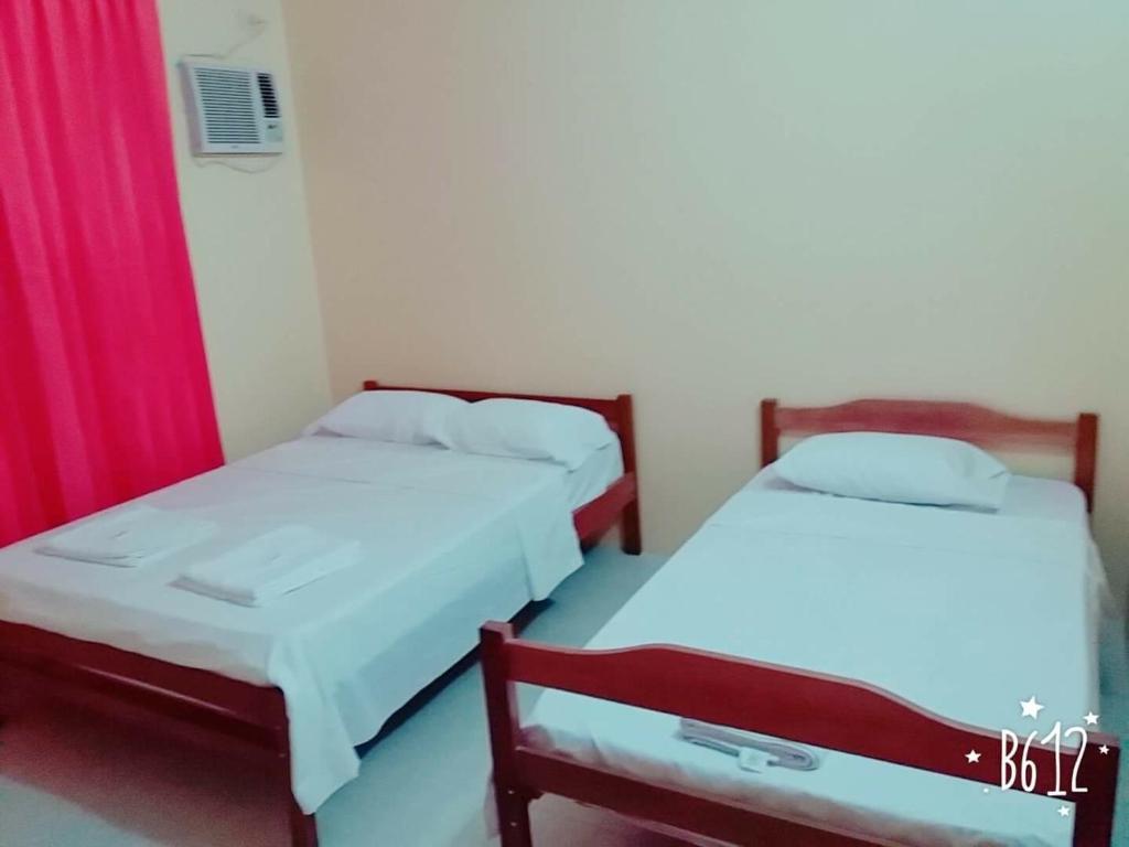 Postel nebo postele na pokoji v ubytování Hostal Montecarlos
