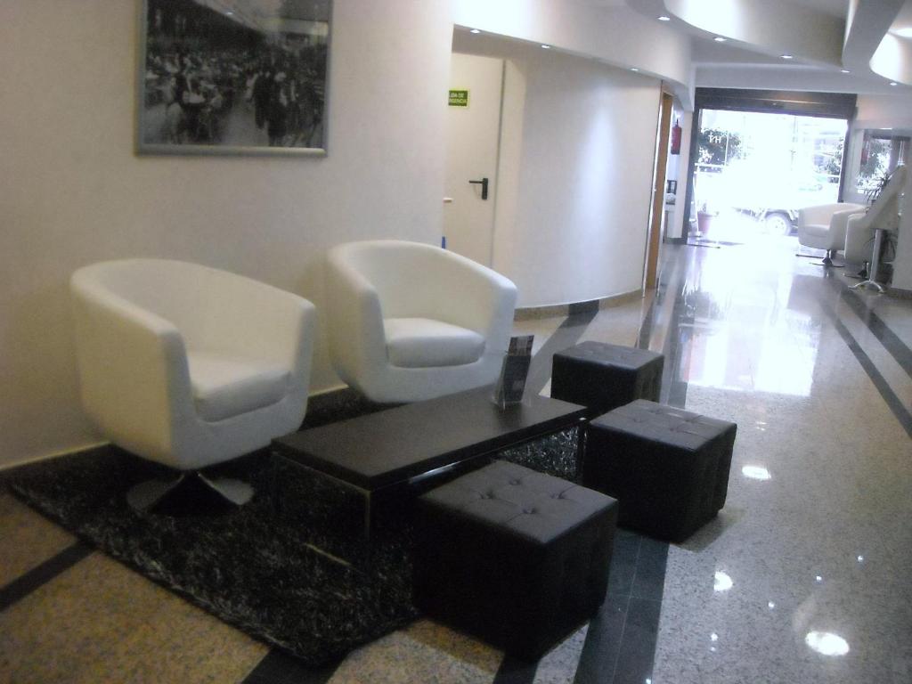 A seating area at Hotel Nuevo Triunfo