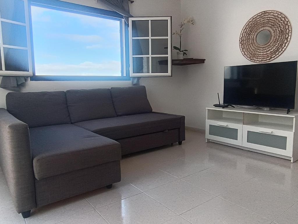 TV a/nebo společenská místnost v ubytování Casa María