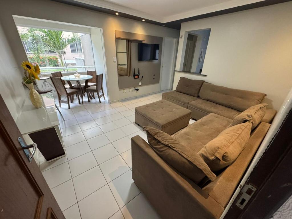Χώρος καθιστικού στο Apartamento 2 quartos próximo a praia do araçagy
