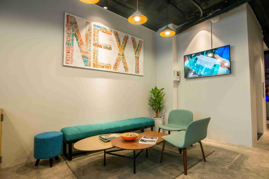 TV a/nebo společenská místnost v ubytování Nexy Hostel