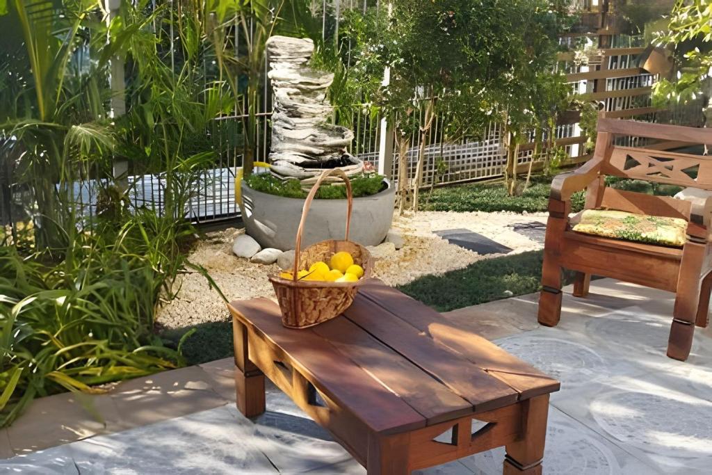 Taman di luar Casa com Lareira e Ar Condicionado Bem Localizada