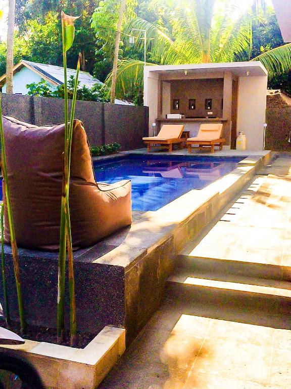 Bazén v ubytování Lazy Inn Kuta Lombok nebo v jeho okolí