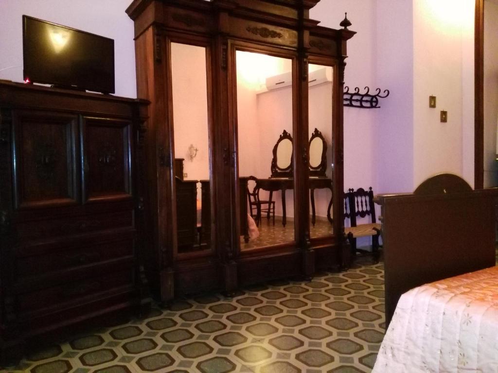 TV a/nebo společenská místnost v ubytování Domus Cicerone
