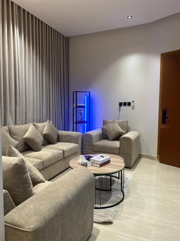 Χώρος καθιστικού στο شقق فندقية بتصميم هادئ