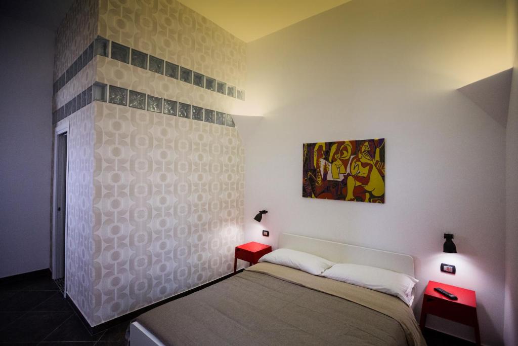 Posteľ alebo postele v izbe v ubytovaní Casa Retro'