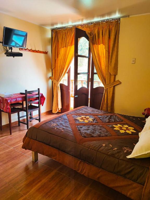Ένα ή περισσότερα κρεβάτια σε δωμάτιο στο Hotel Tambo del Inca