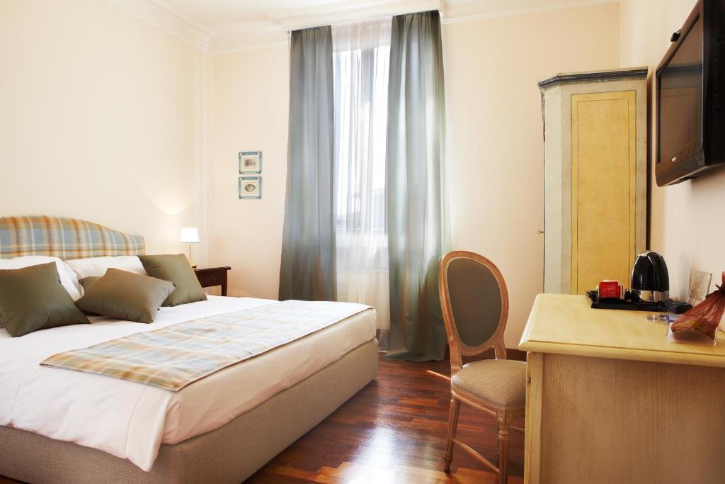 Postel nebo postele na pokoji v ubytování La Villa