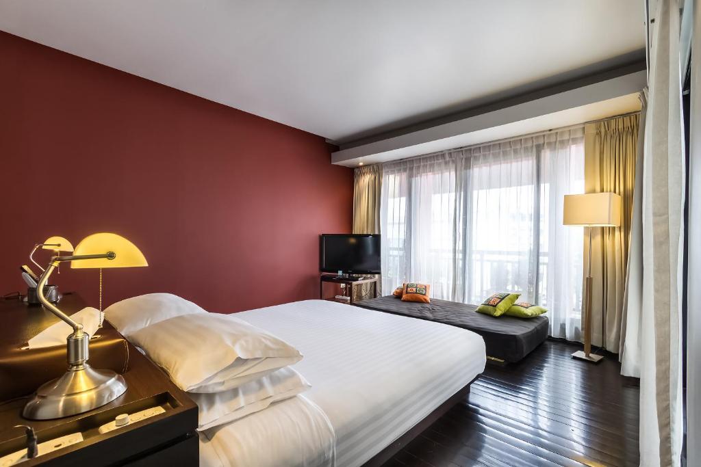 Postel nebo postele na pokoji v ubytování Loogchoob Homestay
