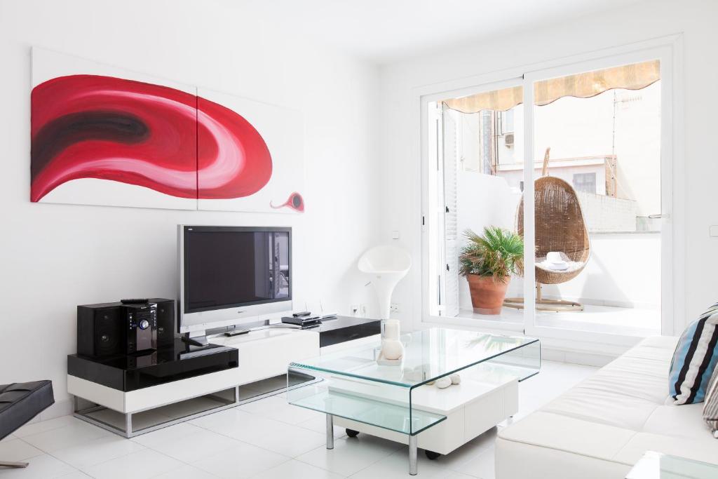 TV a/nebo společenská místnost v ubytování Viva Sitges - Mayo Terrace