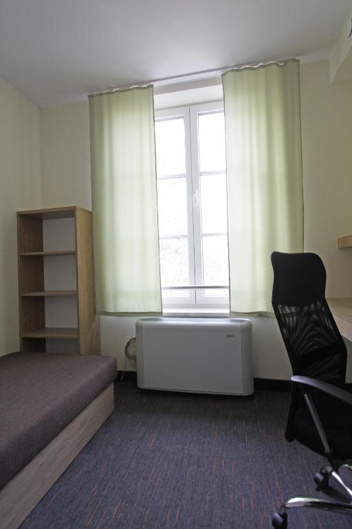 Posezení v ubytování Dom Pomocy Studentom