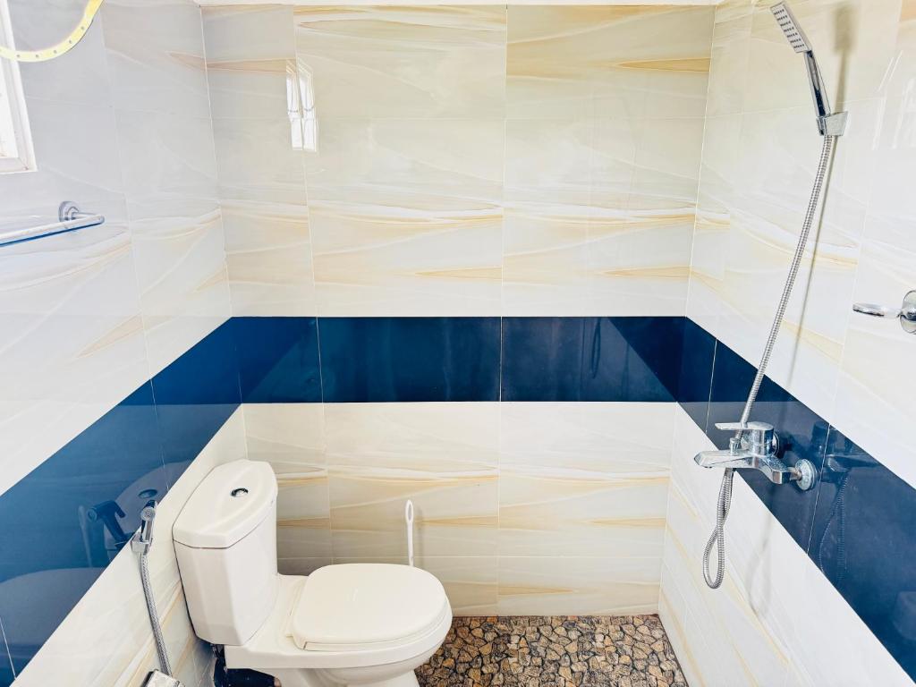 Ένα μπάνιο στο Cozy Haven Guesthouse