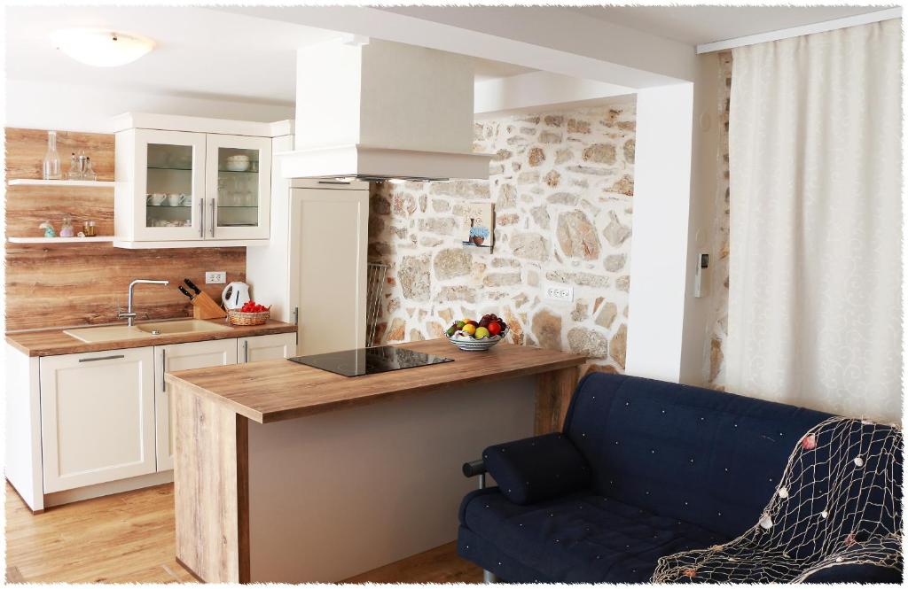 Kuchyň nebo kuchyňský kout v ubytování Apartment Dane