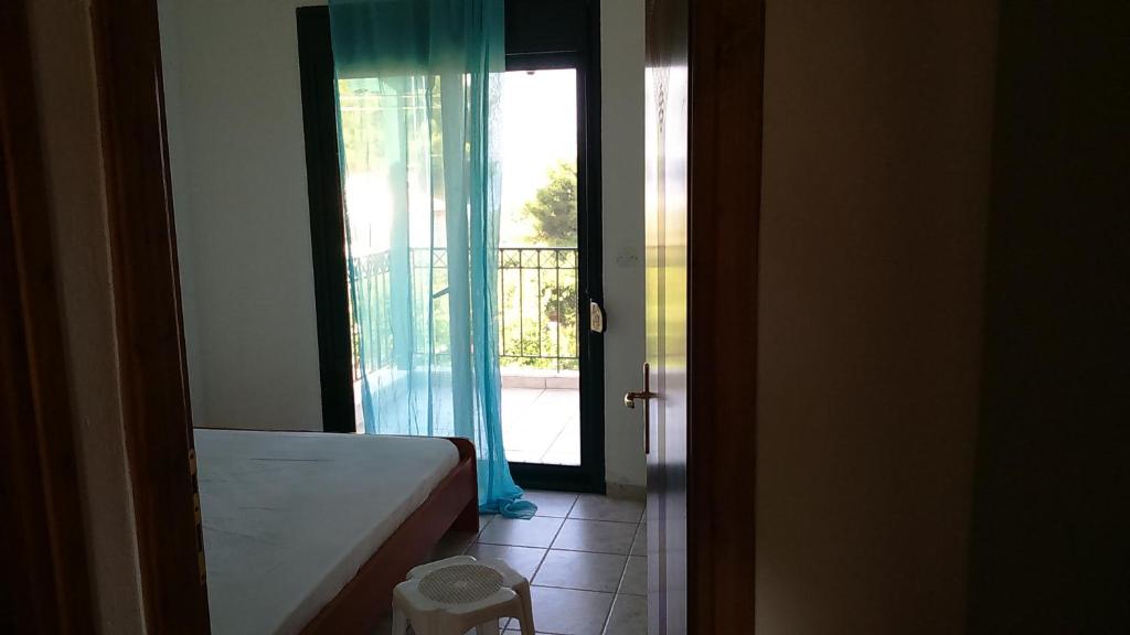 Postel nebo postele na pokoji v ubytování Roxanne villa's