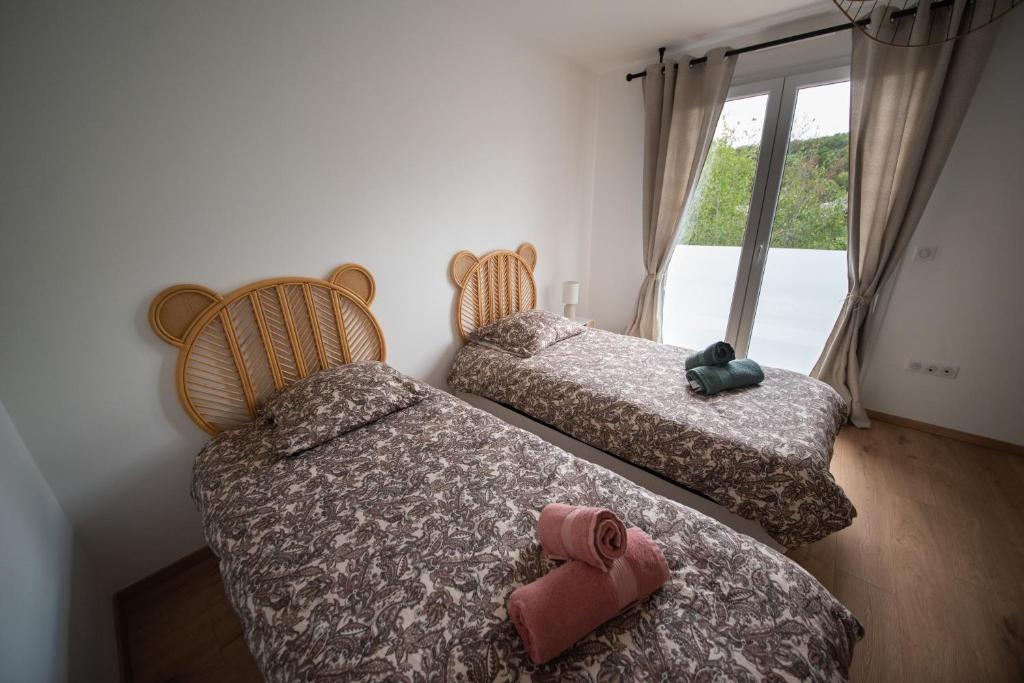 Ένα ή περισσότερα κρεβάτια σε δωμάτιο στο Villa Bulle Dorée & Jacuzzi privé au cœur du centre touristique et thermal face Snowworld