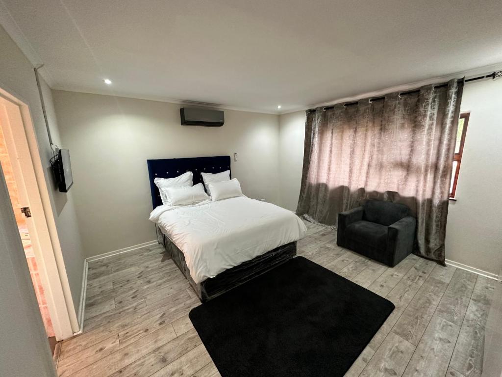 Postel nebo postele na pokoji v ubytování Joy House