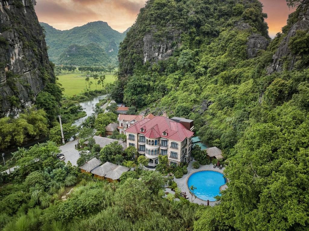 an aerial view of a resort in the mountains at Indochine Boutique Hotel Ninh Bình in Ninh Binh