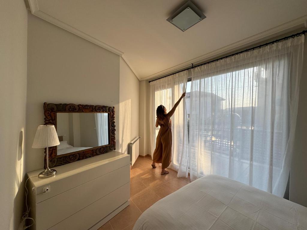 Postel nebo postele na pokoji v ubytování Apartamento Camino a Lancha a un paso de La Playa de Usgo