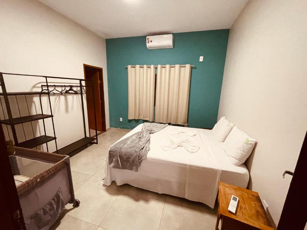Postel nebo postele na pokoji v ubytování Casa Recanto Sonhado II