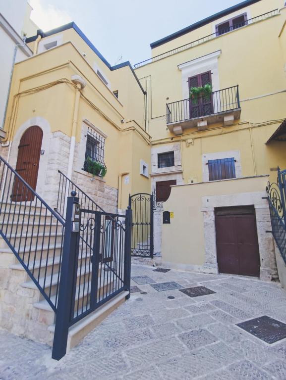 a building with a gate in front of it at L'Alfiere 2 in Corato