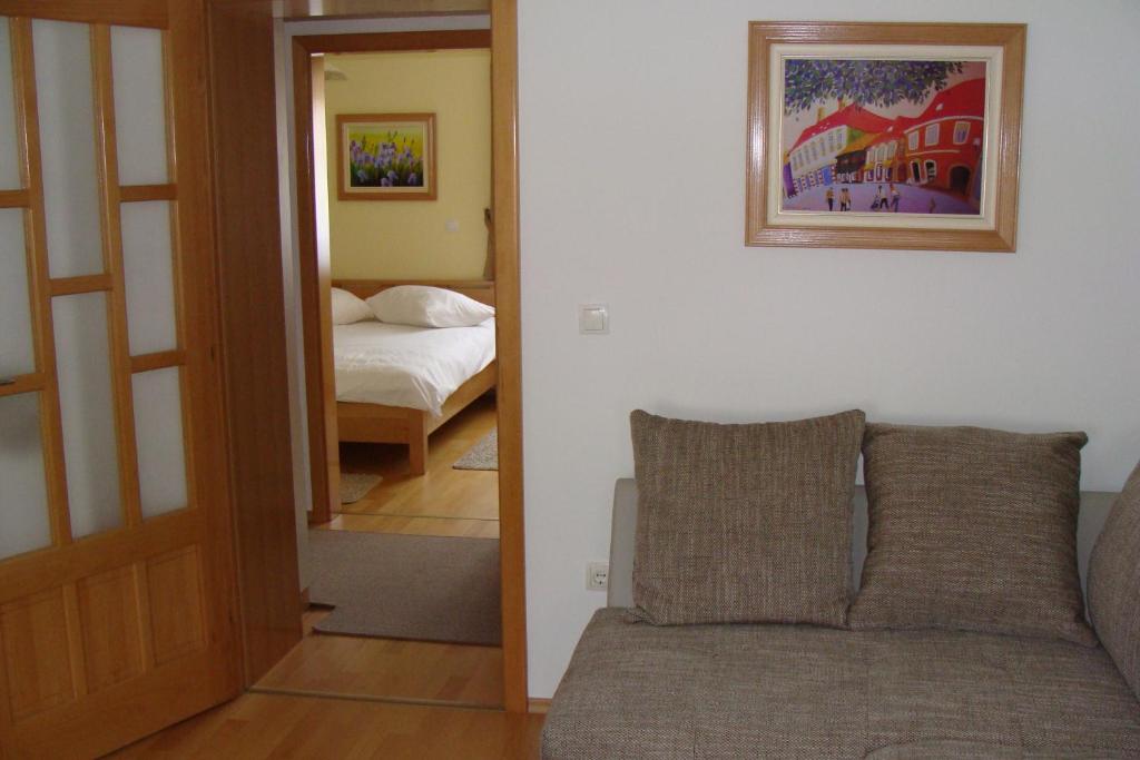 Postel nebo postele na pokoji v ubytování Apartmani Maltar