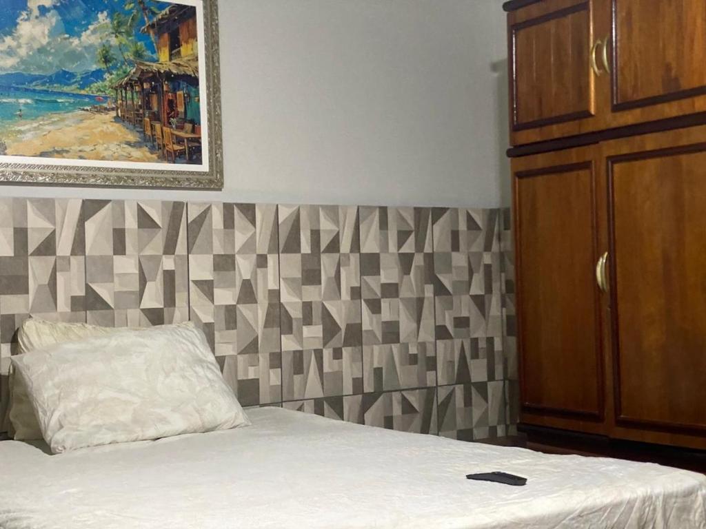 Postel nebo postele na pokoji v ubytování Kit Nets familiar