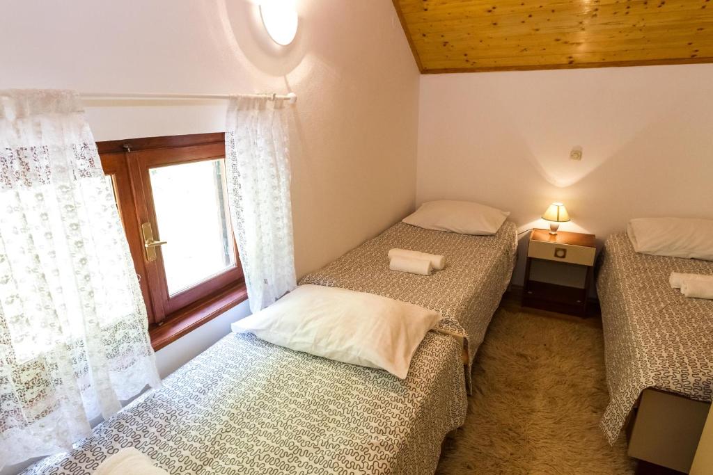 Posteľ alebo postele v izbe v ubytovaní Forest Escape