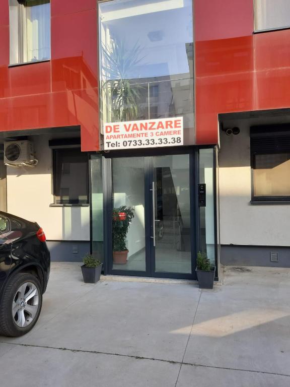 a car parked in front of a building at 4 RENT-Apt 3 camere Tichete,Factură in Constanţa
