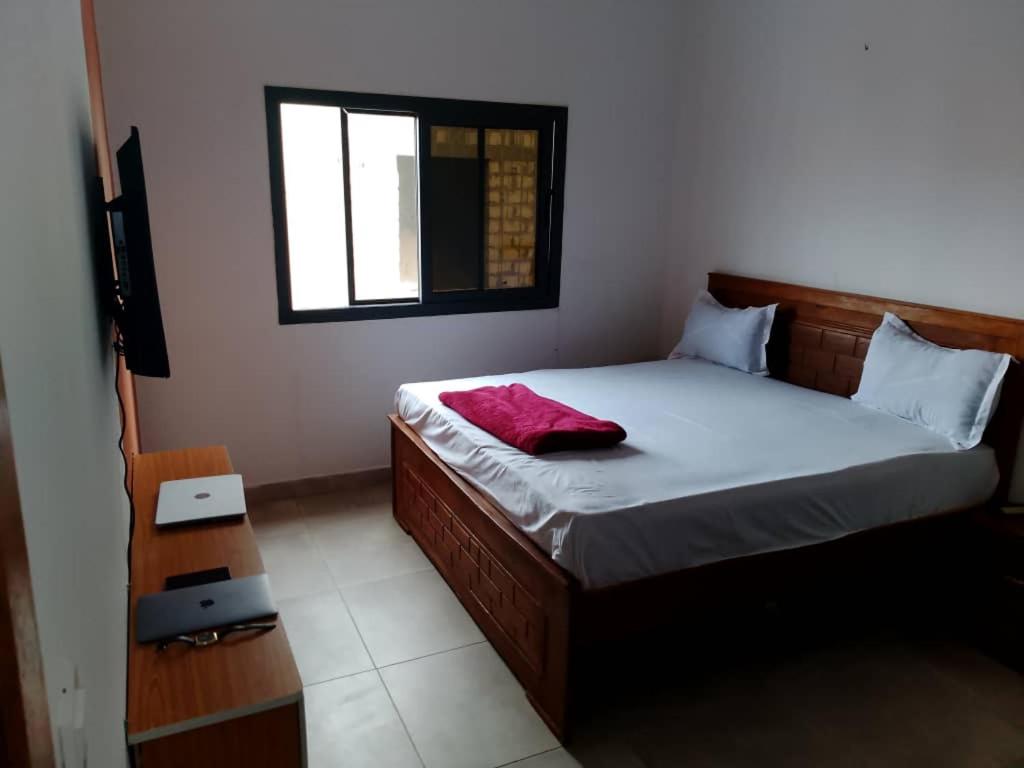 Ένα ή περισσότερα κρεβάτια σε δωμάτιο στο Mini studio avec balcon liberte 6