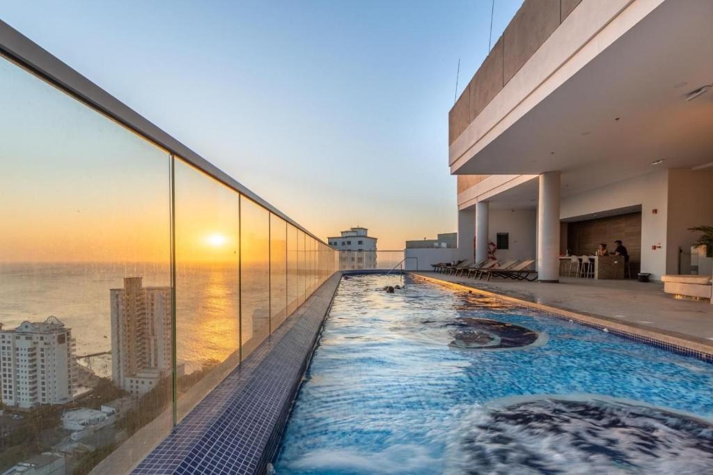 a swimming pool on the roof of a building at Ámbar Roca / Rodadero in Rodadero