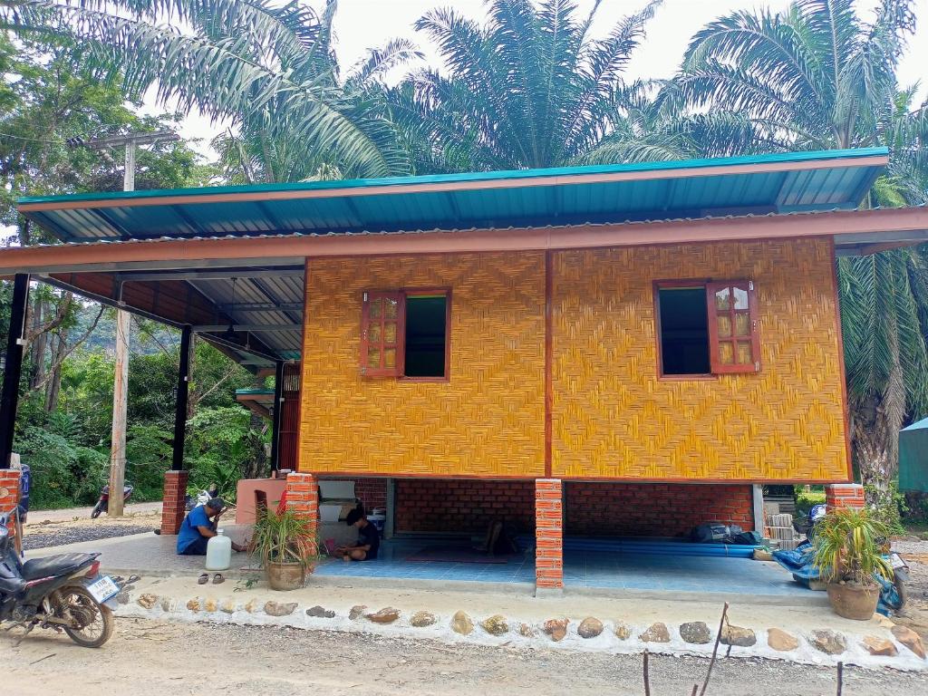 a small house with a roof on top of it at Khai jungle wassanacamp in Ban Thung Lang Tham