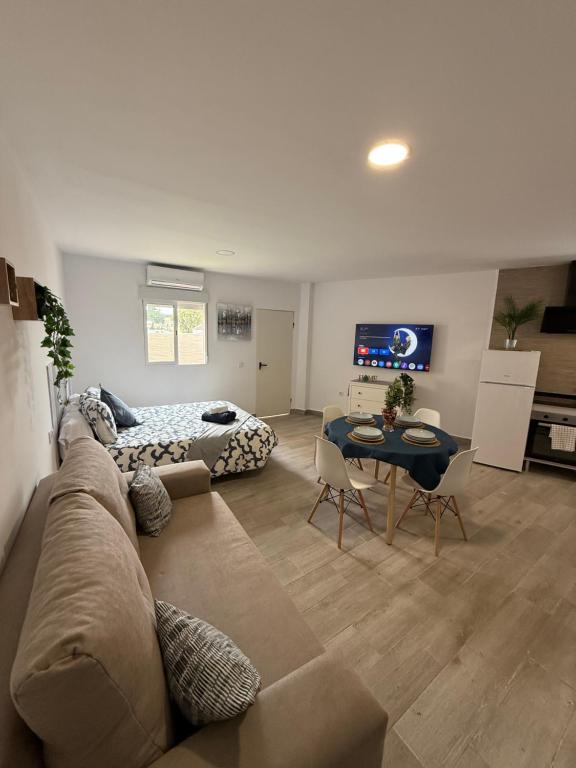 Televiisor ja/või meelelahutuskeskus majutusasutuses Ático Bf Jerez