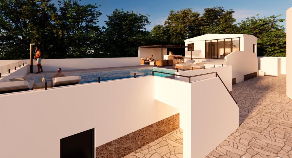 Ein Balkon oder eine Terrasse in der Unterkunft Relaxdiversión en Villa Piscina bbq y cocina ext