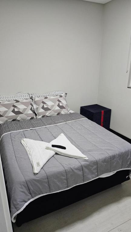 Кровать или кровати в номере Lugar Aconchecante