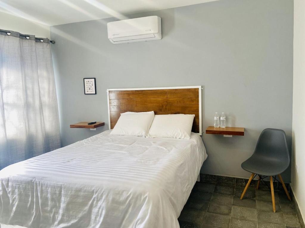 Ένα ή περισσότερα κρεβάτια σε δωμάτιο στο Tibe New and cozy studio at downtown