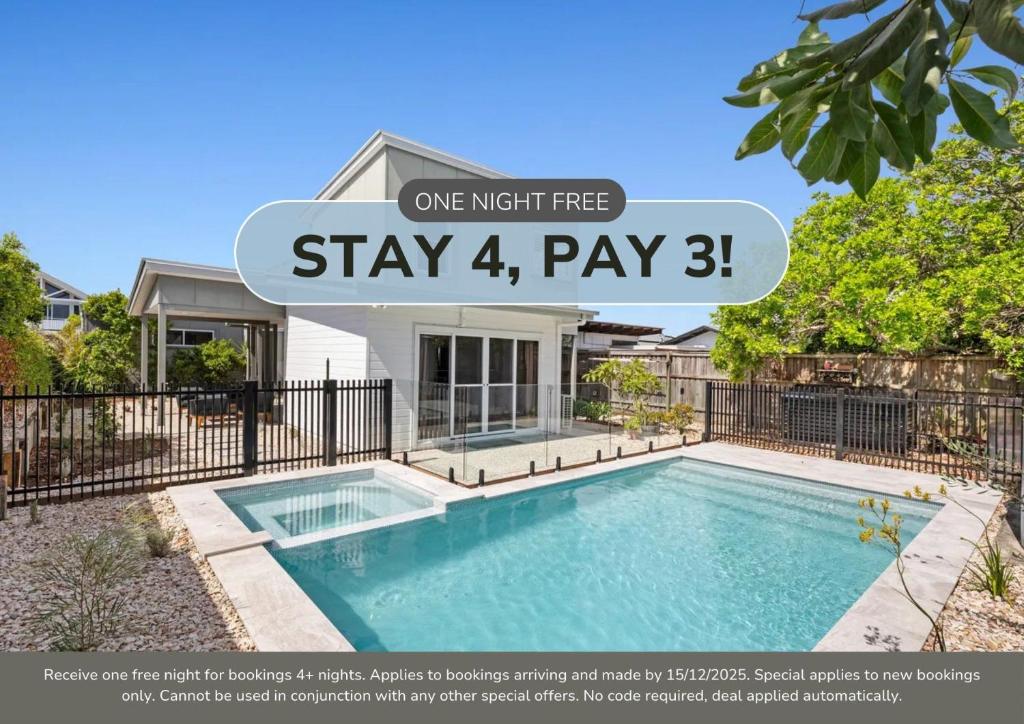 a advertisement for a home with a swimming pool at The Beachside Sanctuary -500m from Beach with Pool & Heated Spa in Casuarina