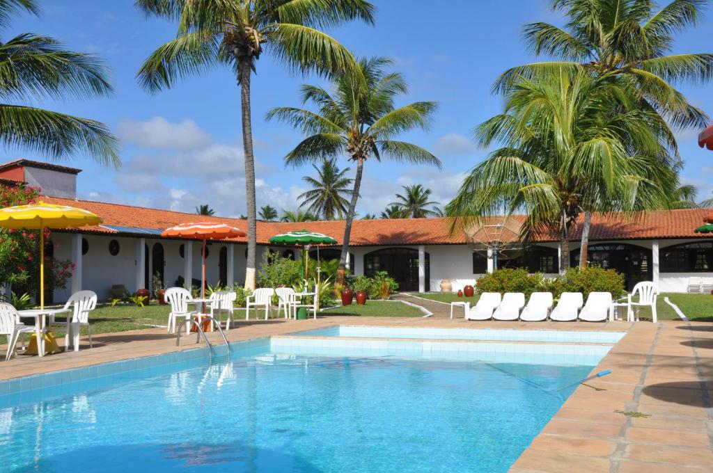 Bazén v ubytování Hotel Praia do Conde nebo v jeho okolí