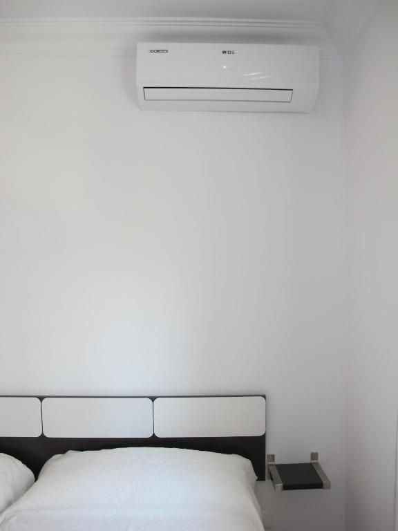 Posteľ alebo postele v izbe v ubytovaní Apartamentos Jimmy 2