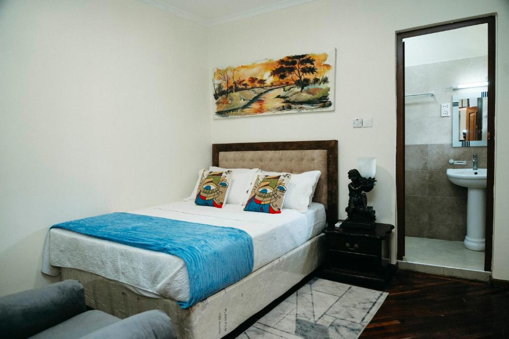 Postel nebo postele na pokoji v ubytování Ma-xels Home Couple's Suite