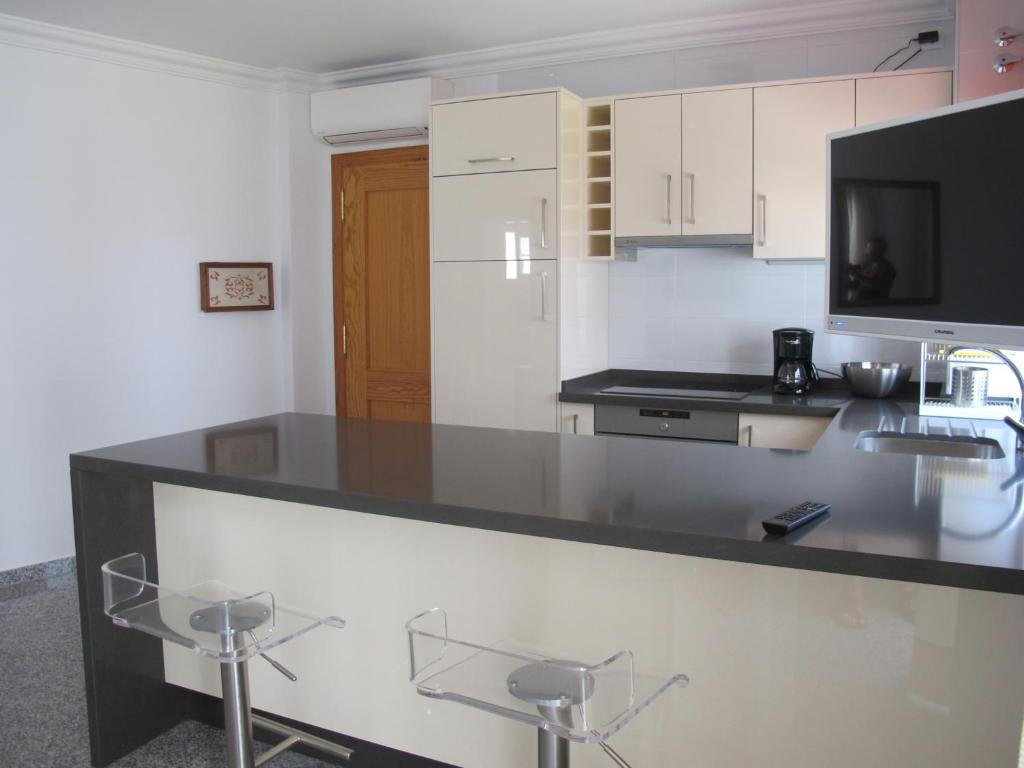Kuchyňa alebo kuchynka v ubytovaní Apartamentos Jimmy 2