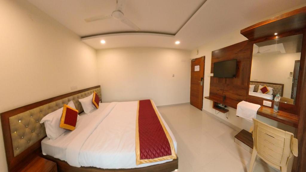 Ένα ή περισσότερα κρεβάτια σε δωμάτιο στο Swagath Inn, Brookefield