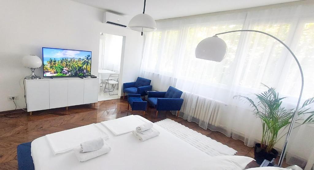 Postel nebo postele na pokoji v ubytování High White apartments 2 NEW