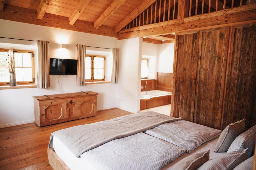 Postel nebo postele na pokoji v ubytování Chalet Zugspitze, Kamin, Tiere